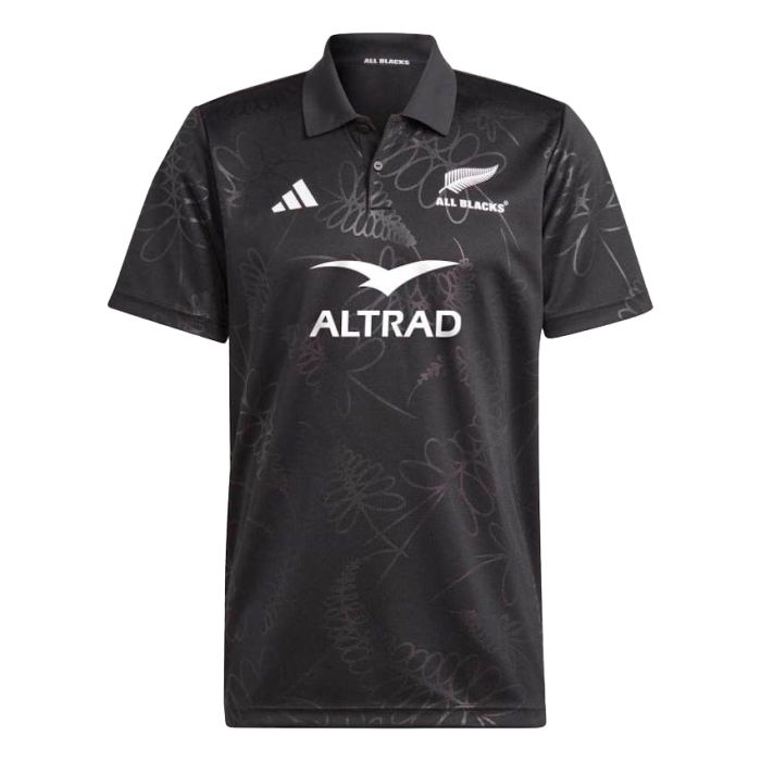 Black All Blacks adidas polo with silver fern motif laid flat